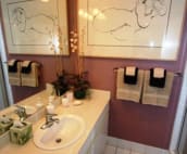Guest bath with stand up shower and matching art