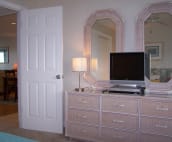 Guest bedroom with flat-screen TV, DVD and VCR