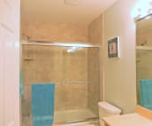 Guest bath with tiled tub and shower