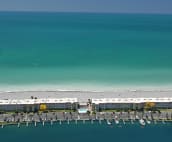 We are on a VERY narrow strip of sand with direct beach and bay views