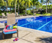 Grab a towel, book and sunglasses for relaxation by the pool.