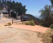 My driveway is the peach colored one to the right of the wood fence