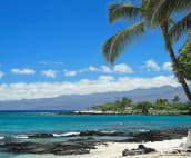 View from beach club toward the Mauna Lani Bay and Bungalow Hotel.
