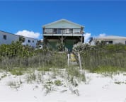 the house is built on stilts overlooking the ocean so the view is spectacular