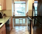 Enjoy cooking in Spinnaker's modern waterfront kitchen with all appliances