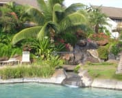 Maui Kamaole pool with waterfall and sand-bottom spa
