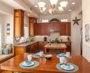 Kitchen with bar that seats 4