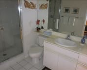 Second bathroom with shower across from second bedroom
