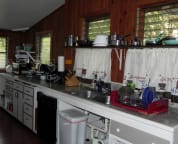 Kitchen offers Microwave, Britta Filtered Water, Ninja Juicer, Expresso Coffee Machine, Bean Coffee Grinder, Drip Coffee Maker, Slice Bread Toaster & Post and Pans