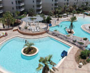 Heated pool on upper level, large pool on lower level