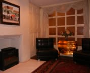 Leather chairs open into single beds for extra guests