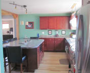 Turn to your right to enter the kitchen
