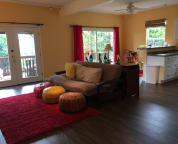 futon set up as the couch~ view from the entry door
