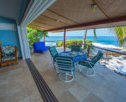 The "disappearing" wall between the living room and lanai is outdoor living at its best.