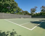 Private tennis court with available equipment rental.