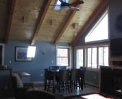 The dining room side of the great room has access to the wrap around deck.