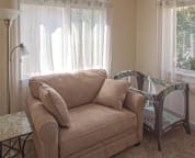 Sitting room at master bedroom with pack n play (crib available too)
