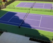 Professional tennis courts built Dec 2014; conveniently located steps away from our building