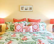 Main floor guest room with luxurious California King bed