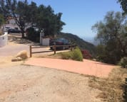 My driveway is the peach colored one to the right of the wood fence