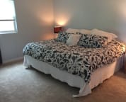 View of the king bed in bedroom