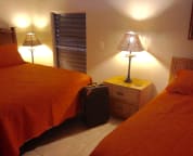 Second bedroom suite with a twin bed and a queen bed, private bath too