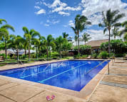 Lap pool and fitness centre with hot tub are just steps from our lanai.
