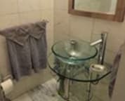 Marble walls and floors in the main bathroom