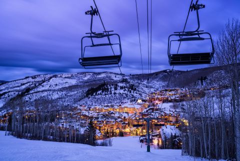 View of Beaver Creek ski resort village at night, illuminated with warm lights