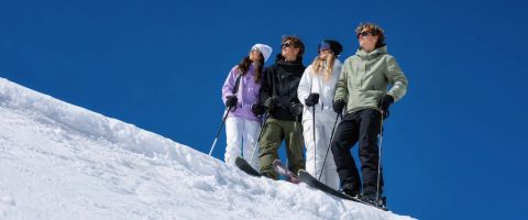 Skiers on the slopes showing what a ski holiday is really like