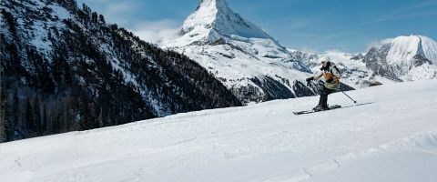 Skiers at an all-inclusive ski resort in the mountains