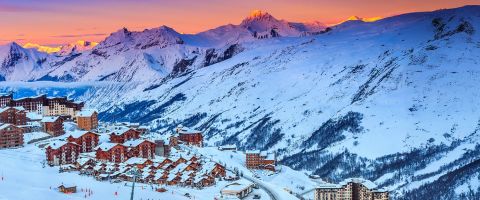 Solo skier on the slopes at a European ski resort