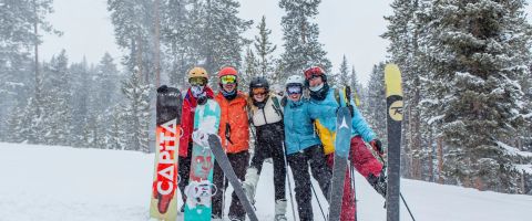 Group of friends together on a group ski holiday