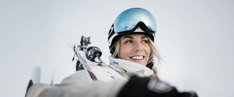 Beginner skier learning to ski on a gentle slope