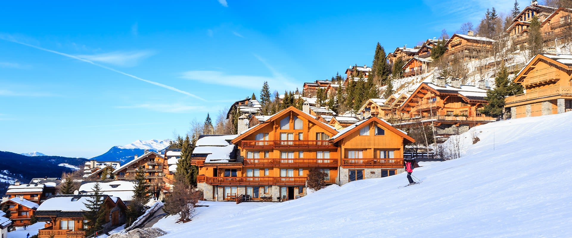 View of Méribel ski chalets covered by snow