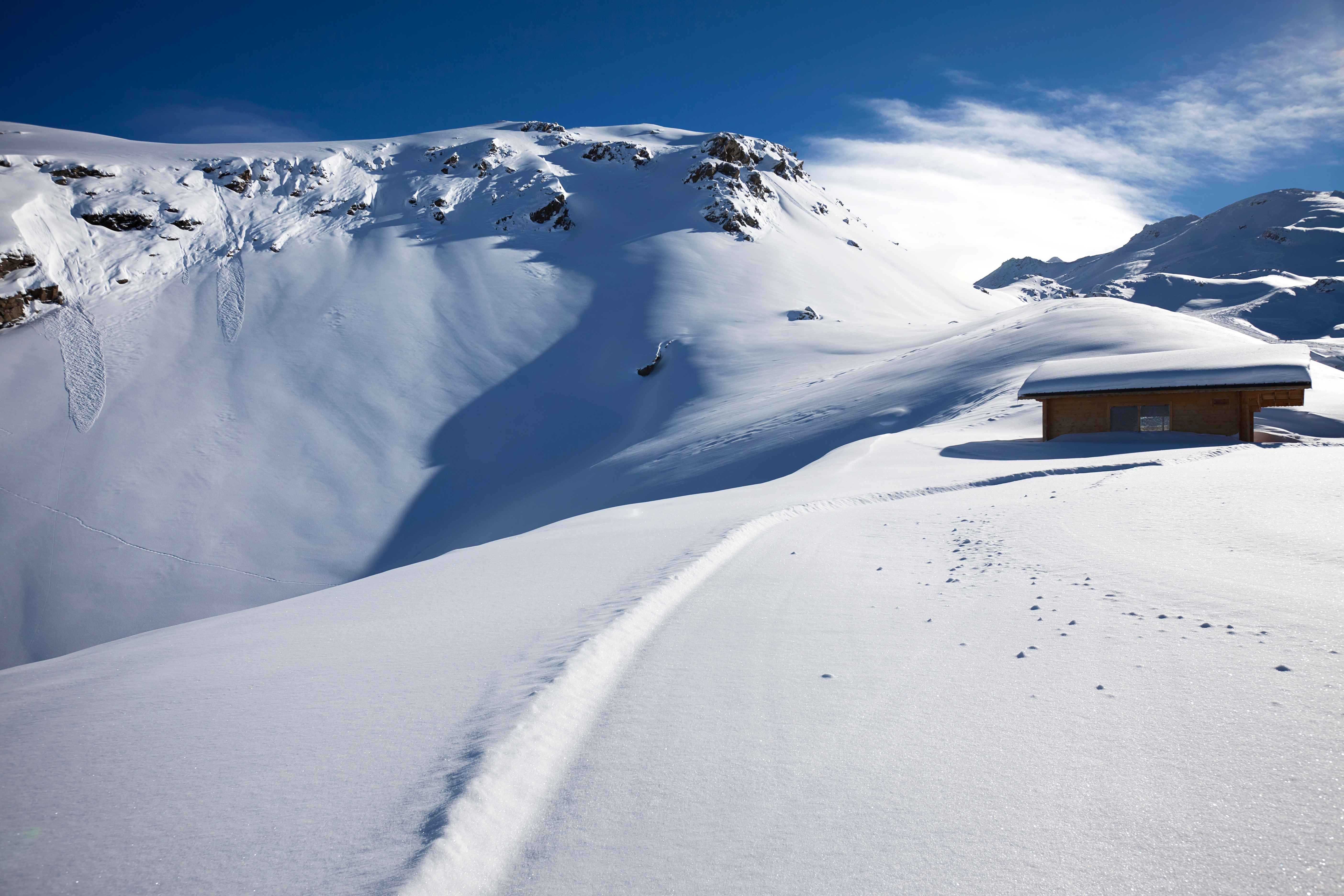 Snow-covered slopes and peaks in the French Alps