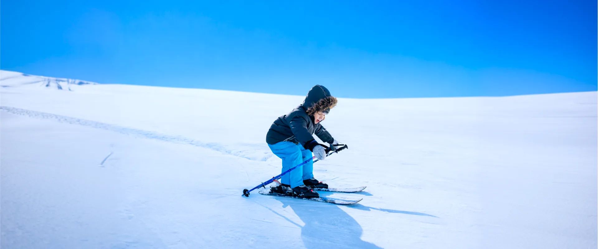 Families skiing during a half term ski holiday