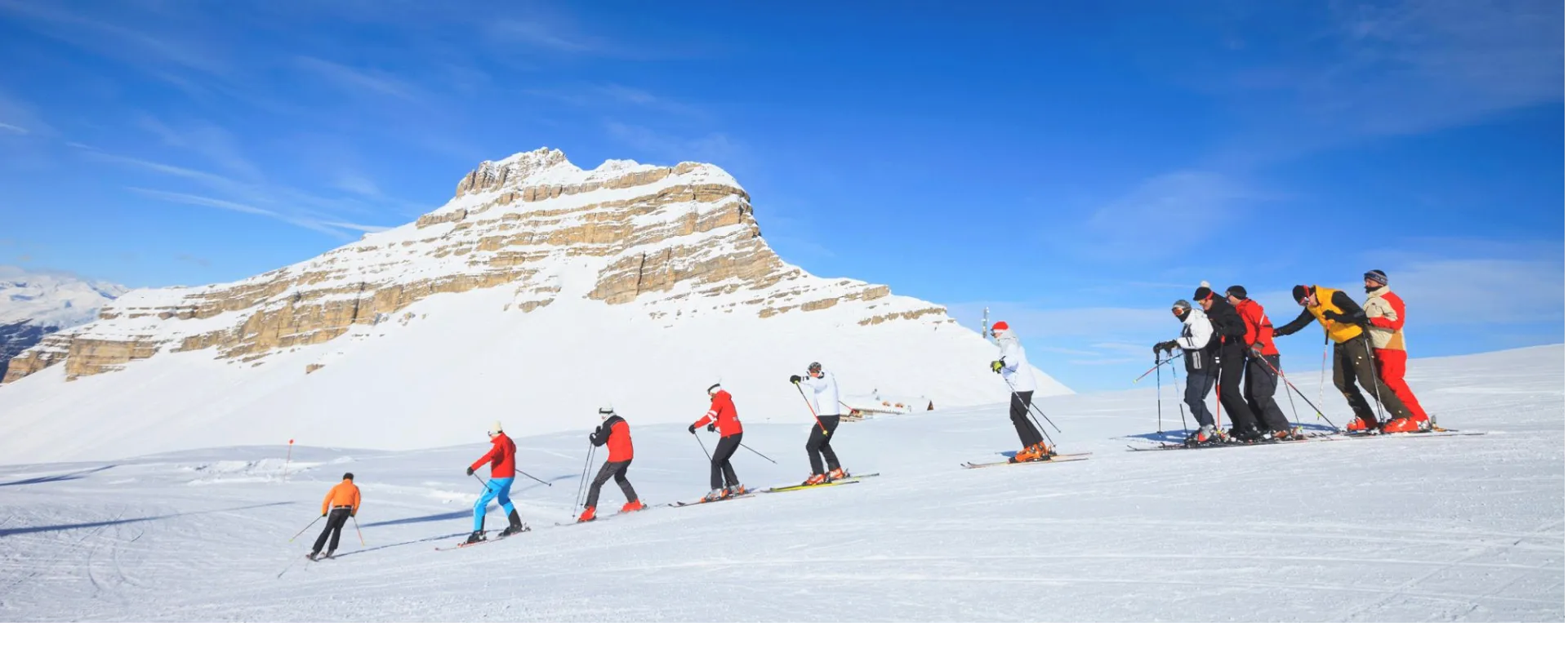 Ski school group booking lessons on the slopes