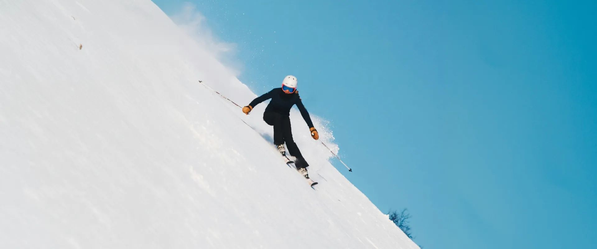 Skier and snowboarder side by side on the slopes