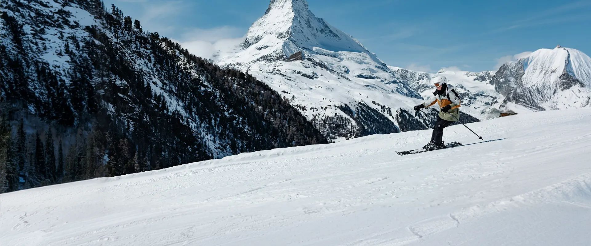 Skiers at an all-inclusive ski resort in the mountains