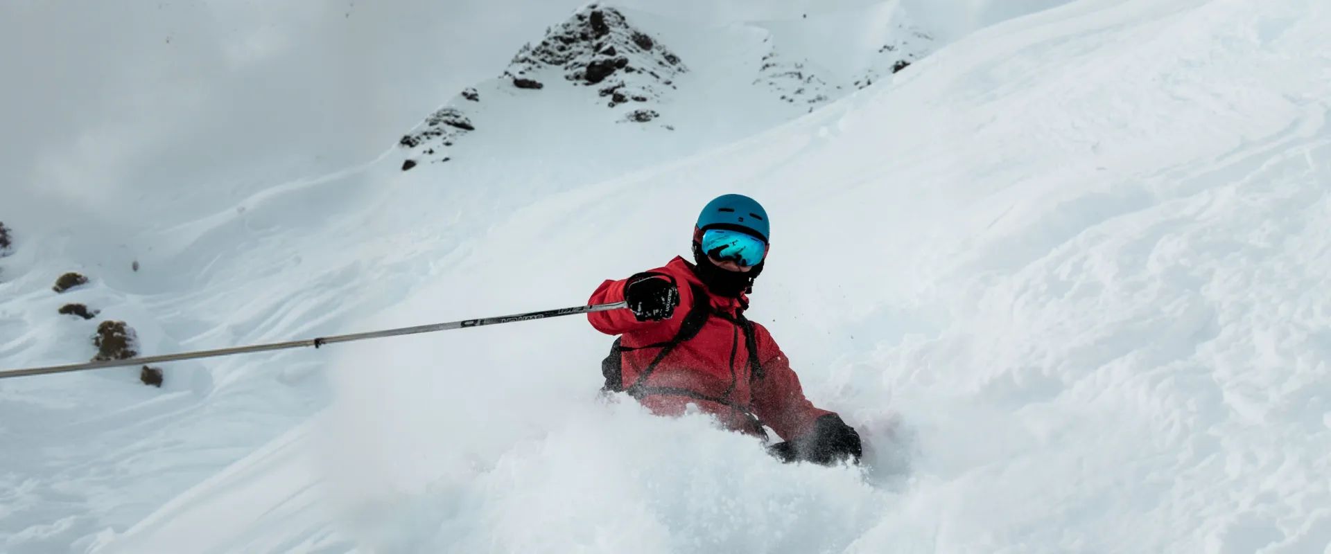 Solo skier enjoying a ski holiday alone on the mountain