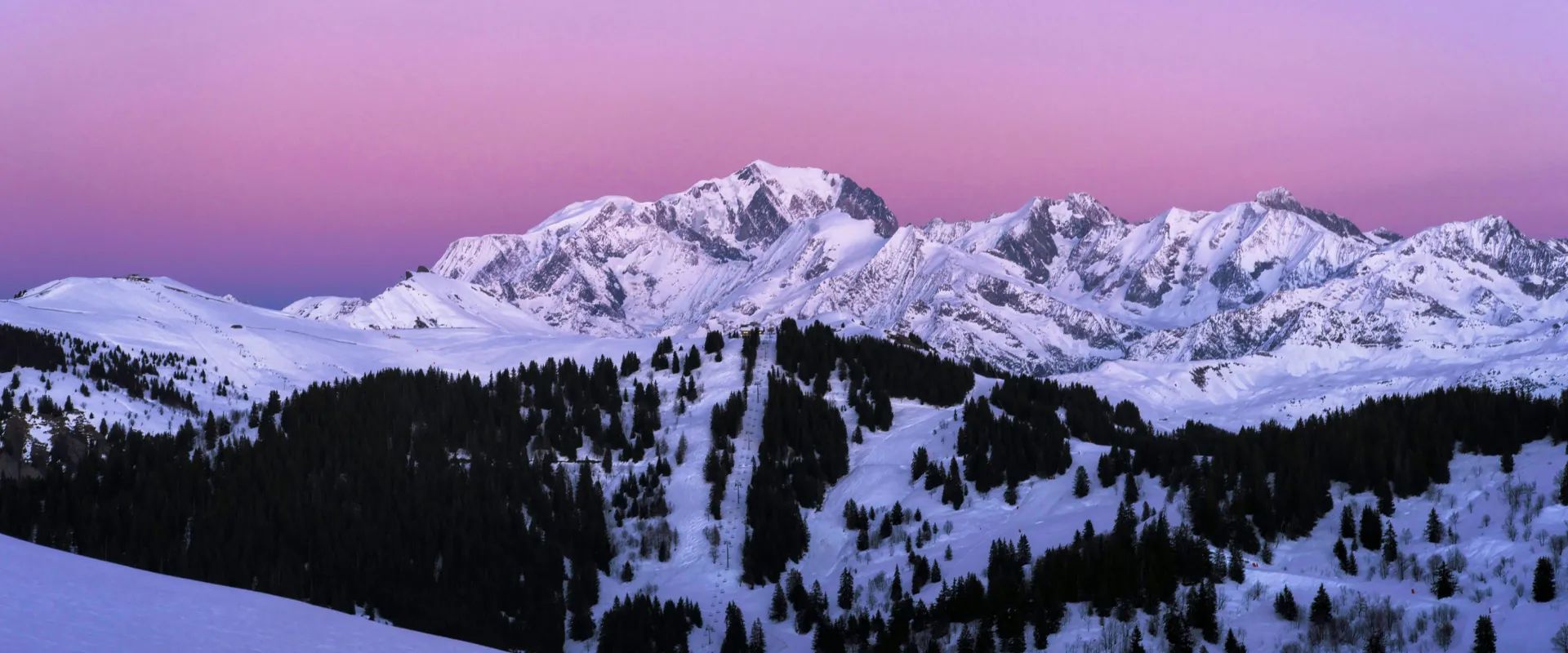 Couple skiing together at a European ski resort