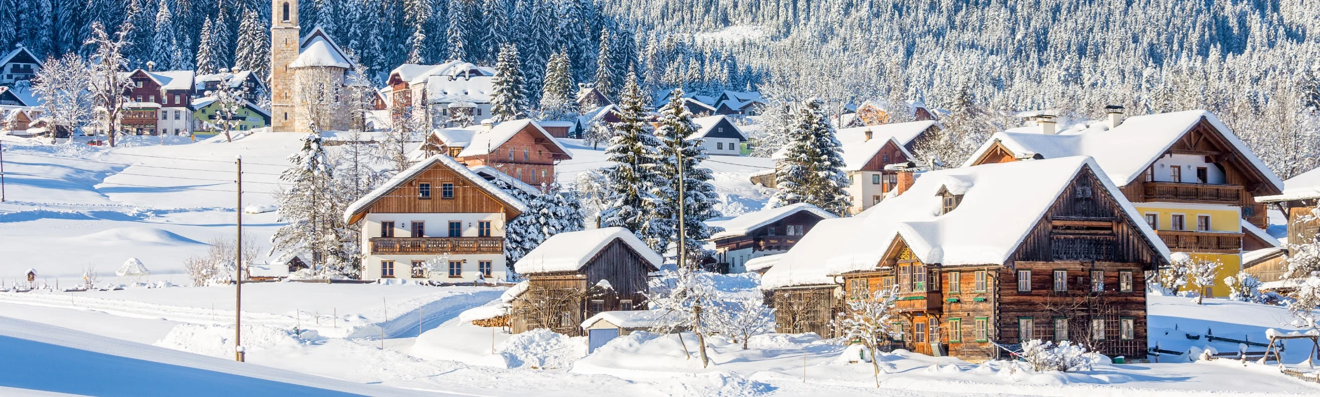 Austrian ski resort with traditional chalets in winter time