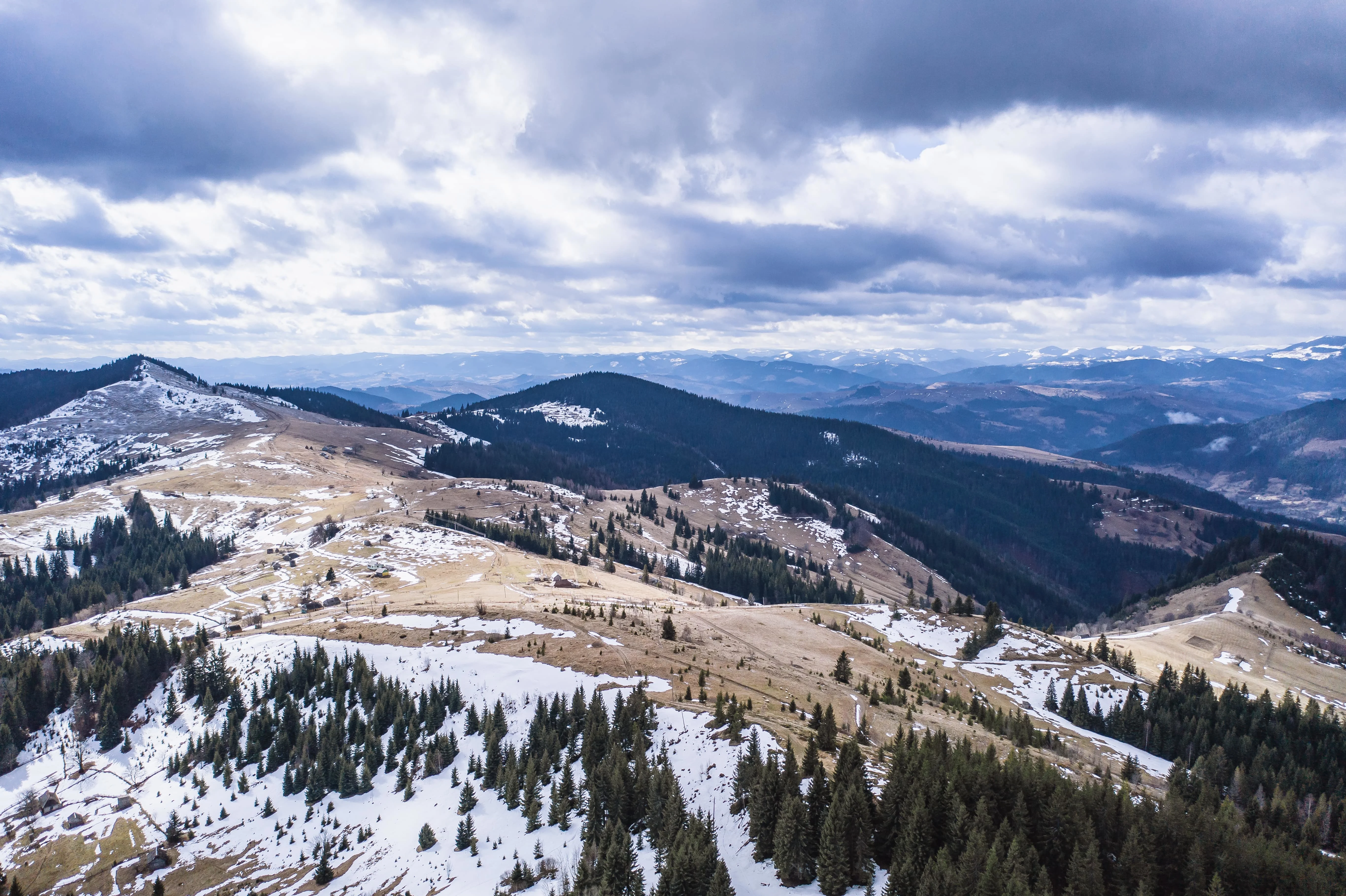 Mountains covered by light snow