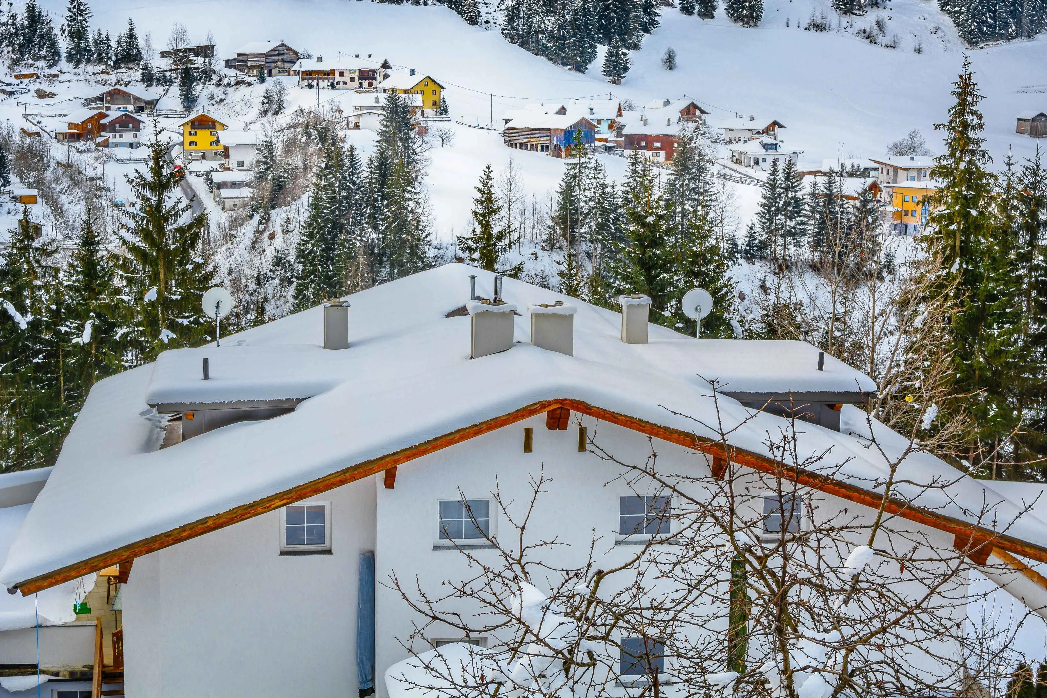 Ischgl ski resort winter time under a blue sky
