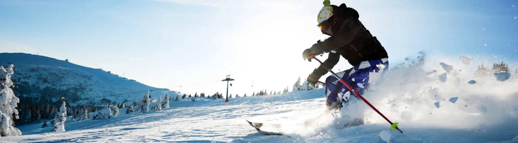 skier descending on fresh powder