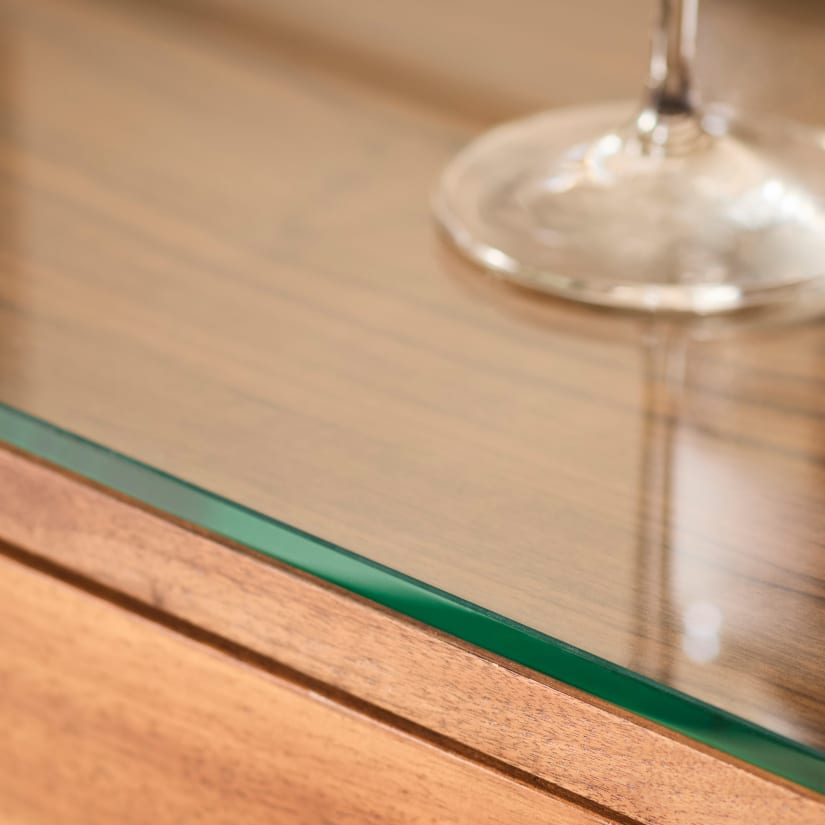 Close-up of glass top edge of the sideboard