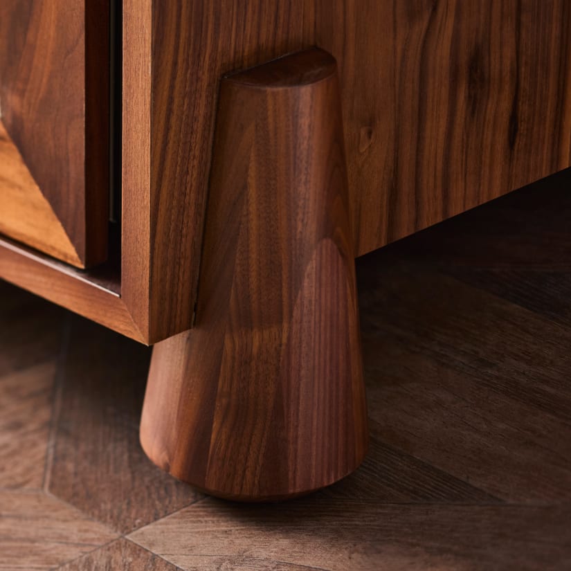 Close-up of solid wooden leg/base of the sideboard