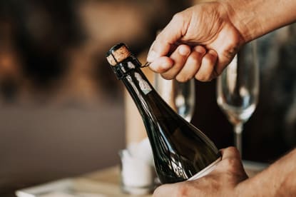 What Does 'Riddling' Mean in Wine? | Wine Enthusiast