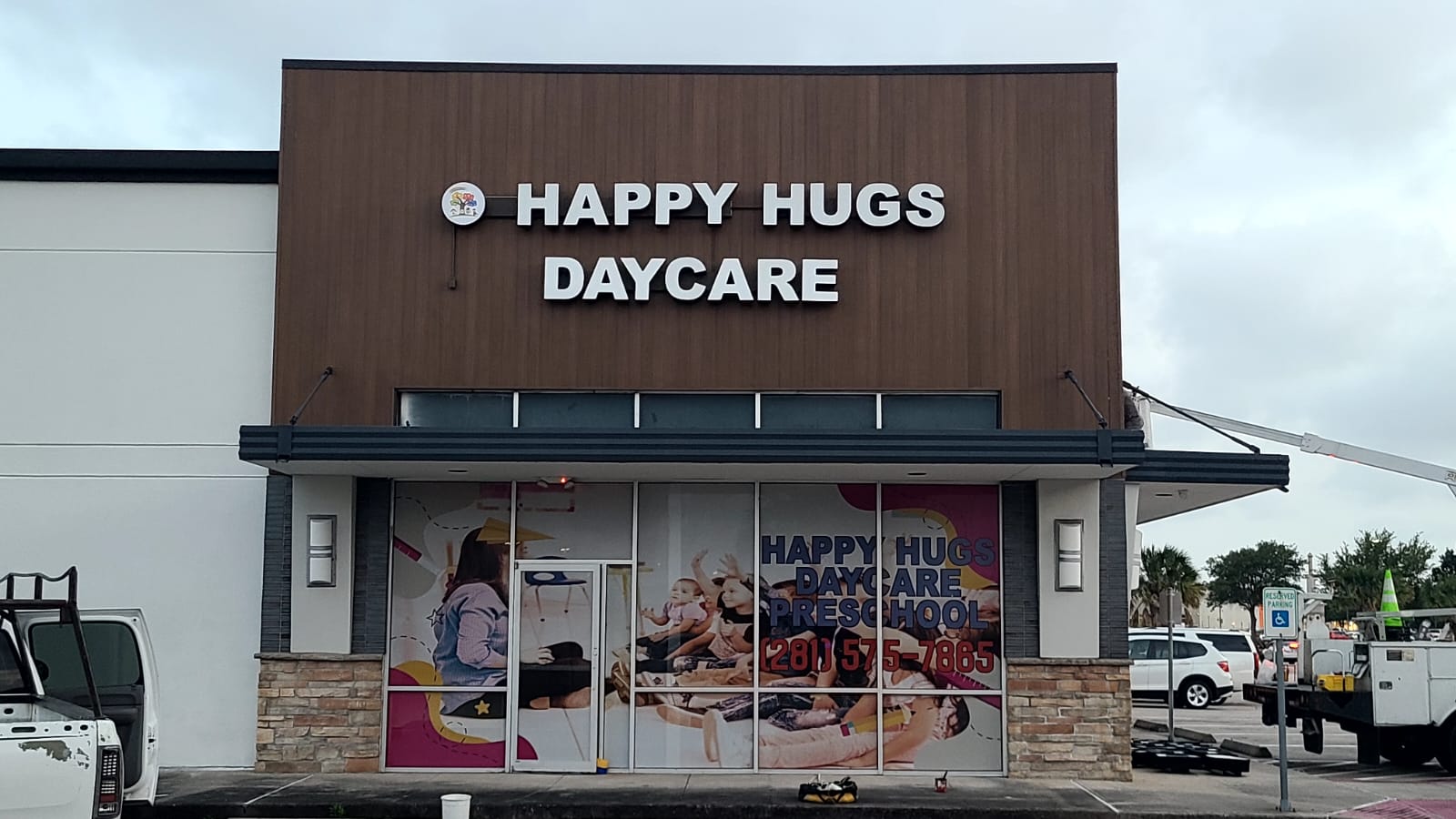 Daycare storefront with full window graphics and dimensional letters